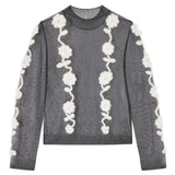 Top semi trasparente con applicazioni in nero e bianco Ganni - donna 