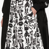 Shorts con stampa Fantasia in nero e bianco Comme des garcons black - unisex 
