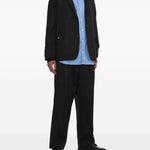 Pantaloni gessati con pieghe in nero Comme des garcons homme - uomo 