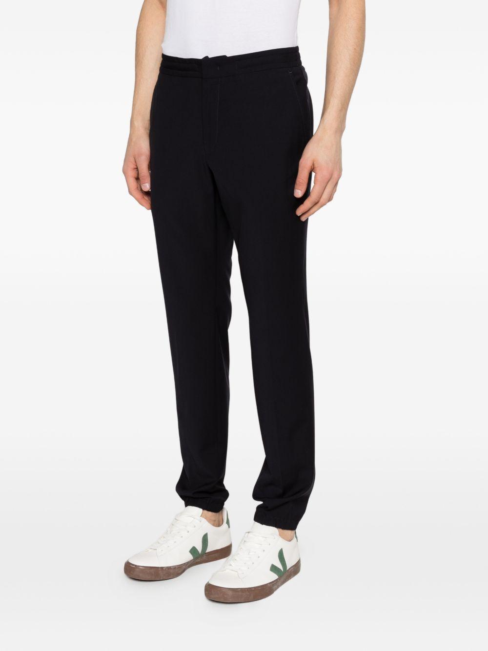 Pantaloni con chiusura nascosta in blu Zegna - uomo 