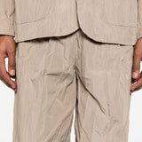 Pantaloni con vita elasticizzata in beige Gongdid design - uomo 