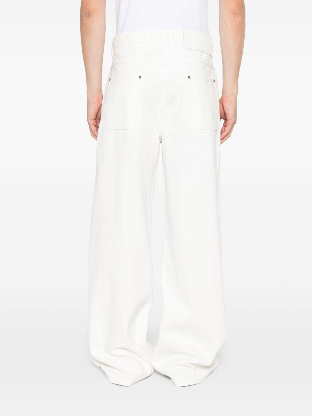 Jeans con ricamo in azzurro Glass Cypress - uomo 