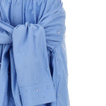 Pantaloni con applicazioni di cristalli in blu 