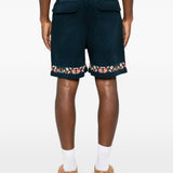 Shorts in twill con ricami floreali in blu Found - uomo 