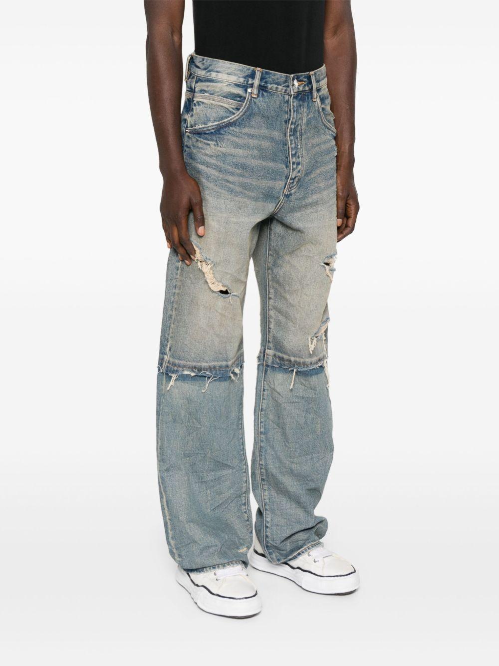 Jeans a gamba ampia con effetto vissuto in blu Purple - uomo 