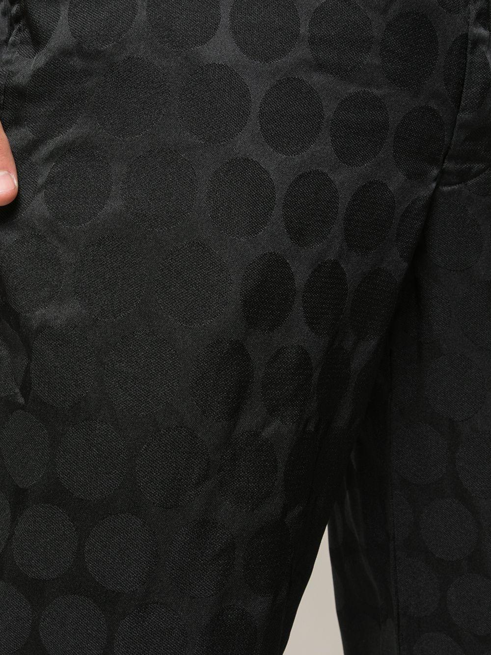 Pantaloni con trama geometrica in nero Comme des Garçons Homme Plus - uomo 