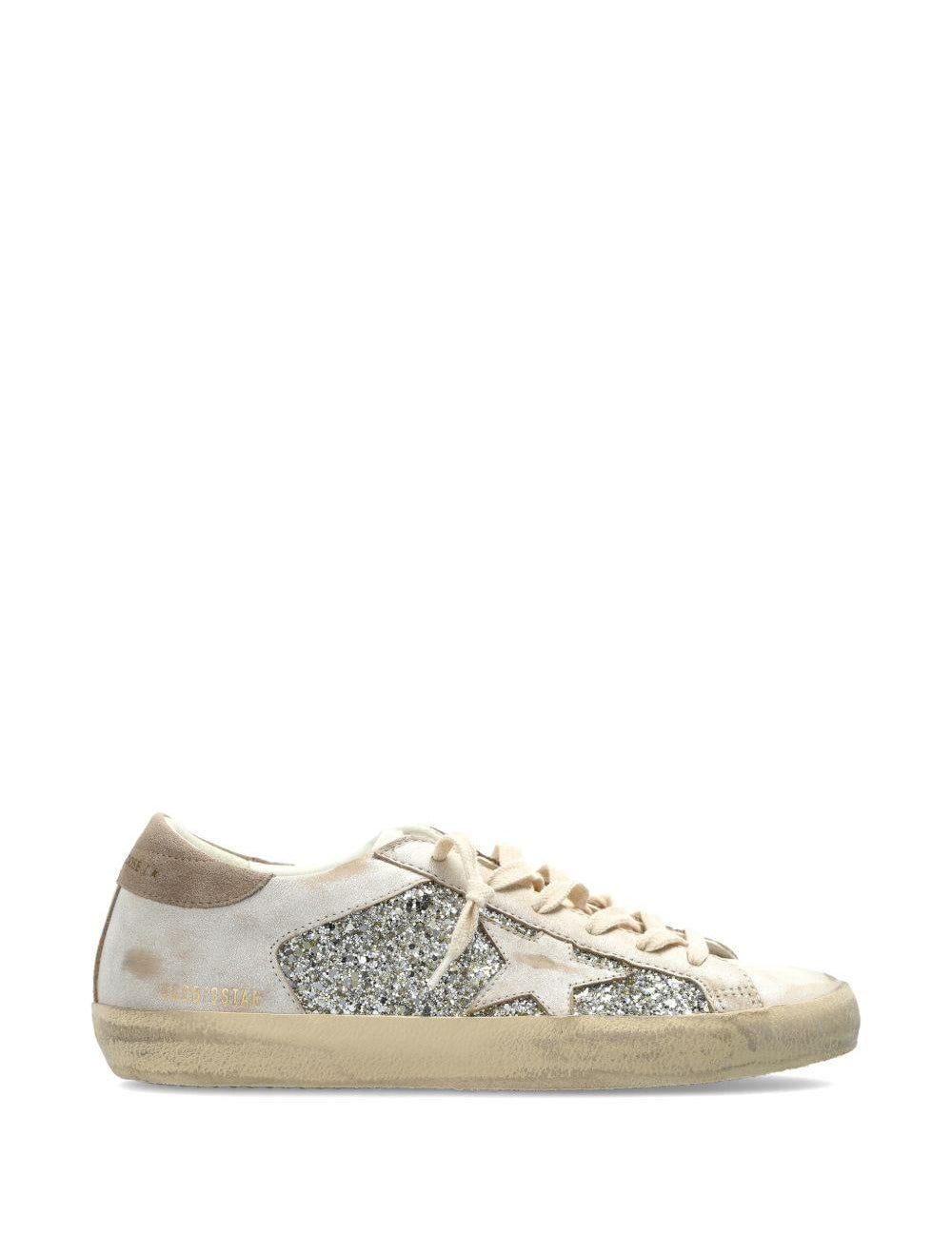 Sneakers super star glitter in avorio e argento golden goose - donna 