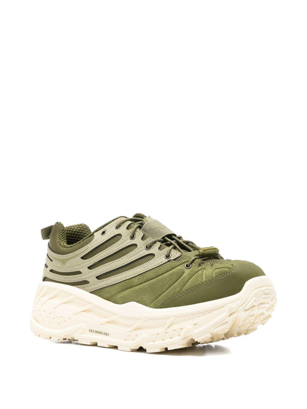 Sneakers con lacci in verde 
