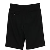 Pantaloni corti con bottoni in nero Comme des Garçons Homme Plus - uomo 