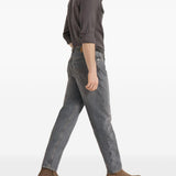 Jeans a cinque tasche in denim grigio con vestibilità iconica. In grigio Brunello cucinelli - uomo 