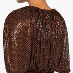 Top arricciato decorato con paillettes 