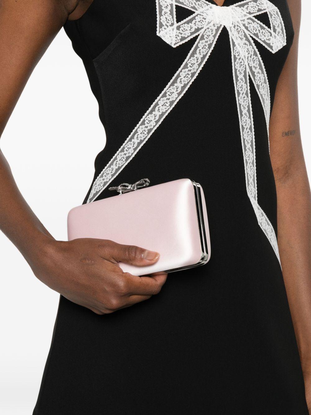Clutch in raso con fiocco in rosa 