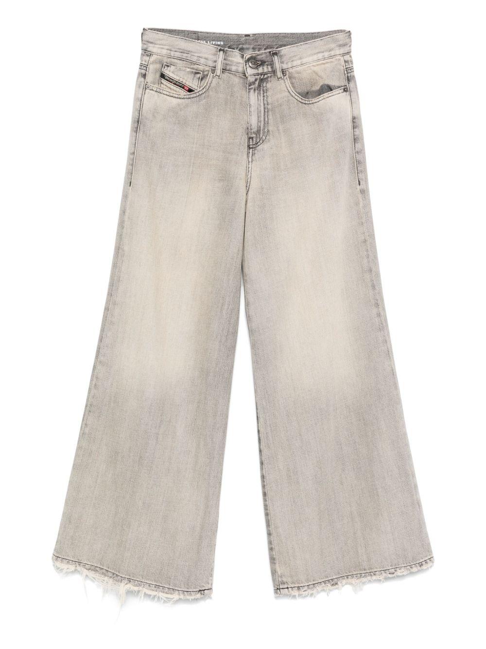 Jeans con orlo grezzo in grigio Diesel - uomo 