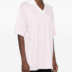 Polo con logo e ricamo a v in bianco Courrèges - donna 
