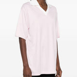 Polo con logo e ricamo a v in bianco Courrèges - donna 