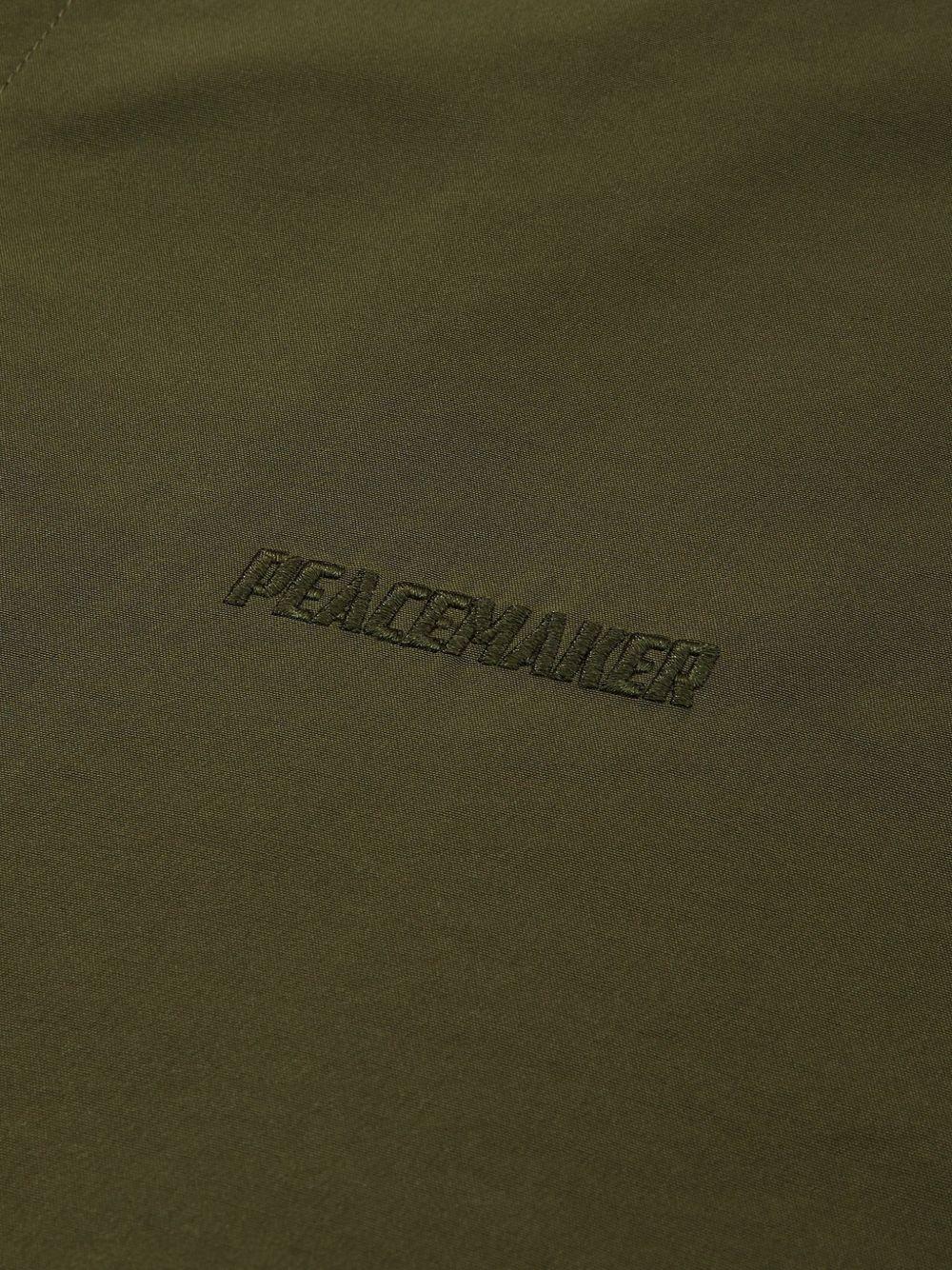 Camicia con grafica in verde Oamc peacemaker - uomo 