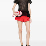 Top con maniche a sbuffo e volant in nero Simone rocha - donna 