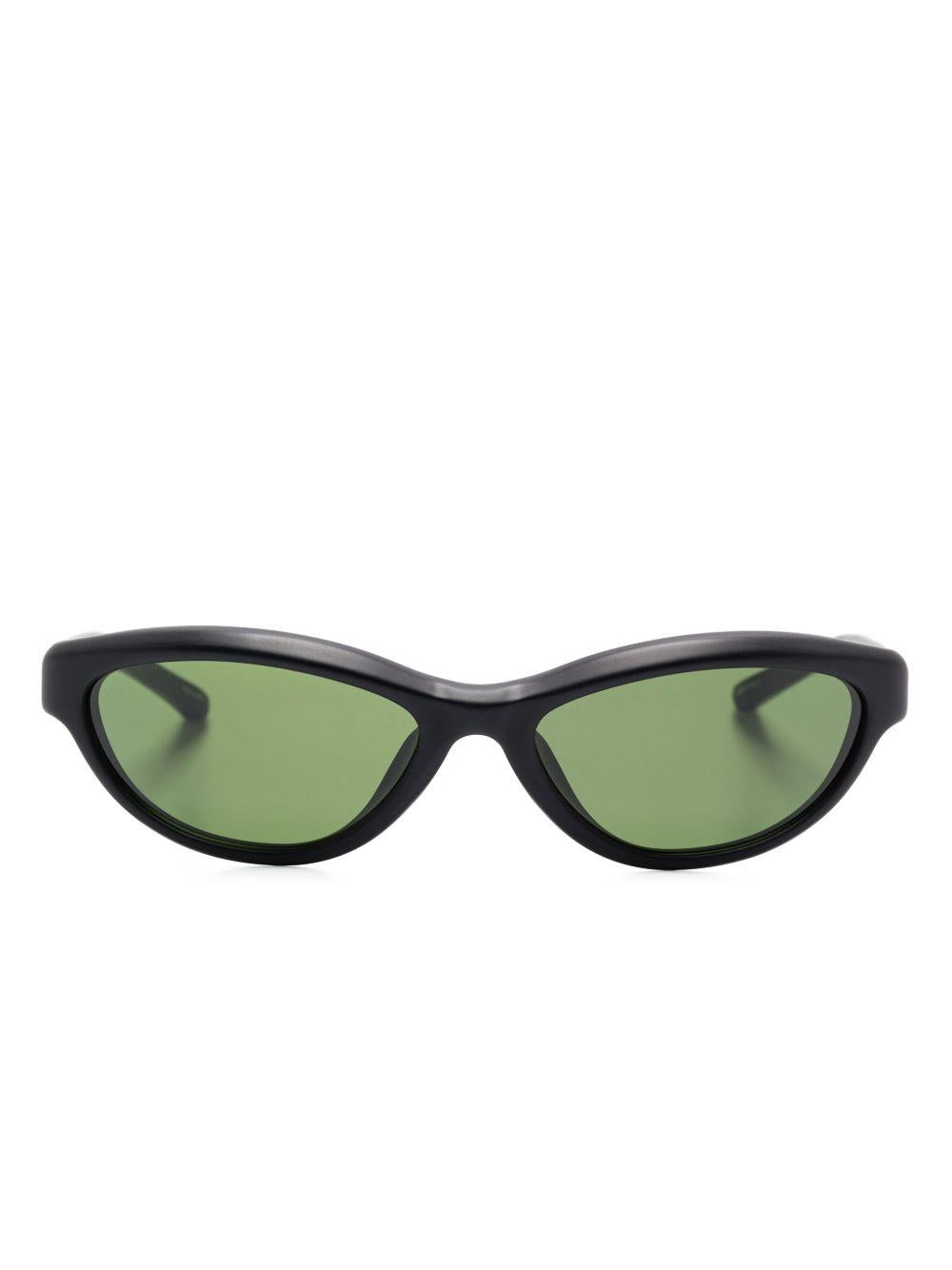 Occhiali da sole les lunettes curvo in nero Jacquemus - unisex 