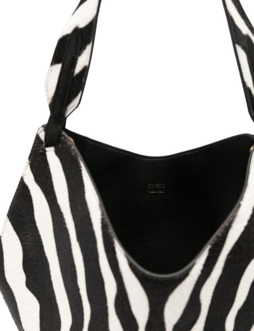Borsa a mano Lotus con stampa zebrata in nero e bianco Khaite - donna 