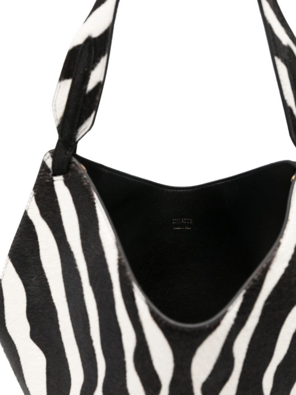 Borsa a mano Lotus con stampa zebrata in nero e bianco Khaite - donna 