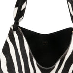 Borsa a mano Lotus con stampa zebrata in nero e bianco Khaite - donna 