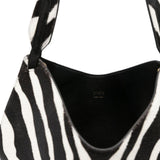 Borsa a mano Lotus con stampa zebrata in nero e bianco Khaite - donna 