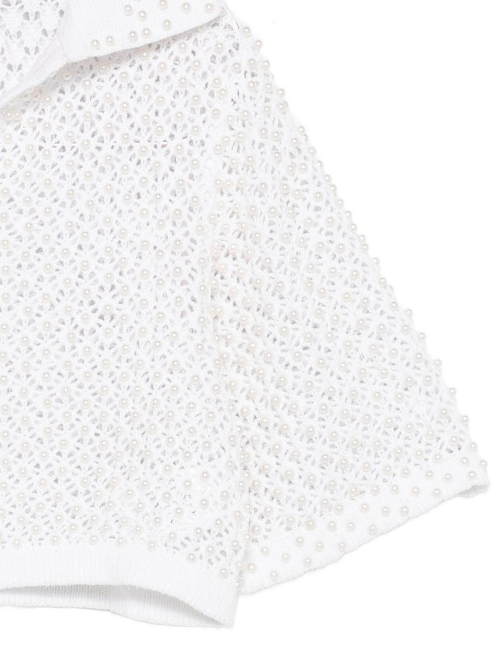 Top in maglia con perle in bianco 