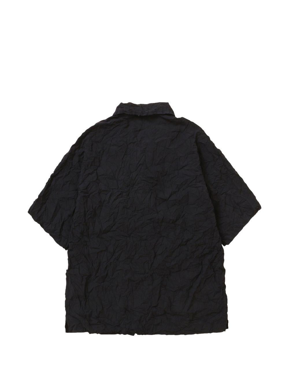 Camicia a maniche corte con tasca in nero And wander - uomo 