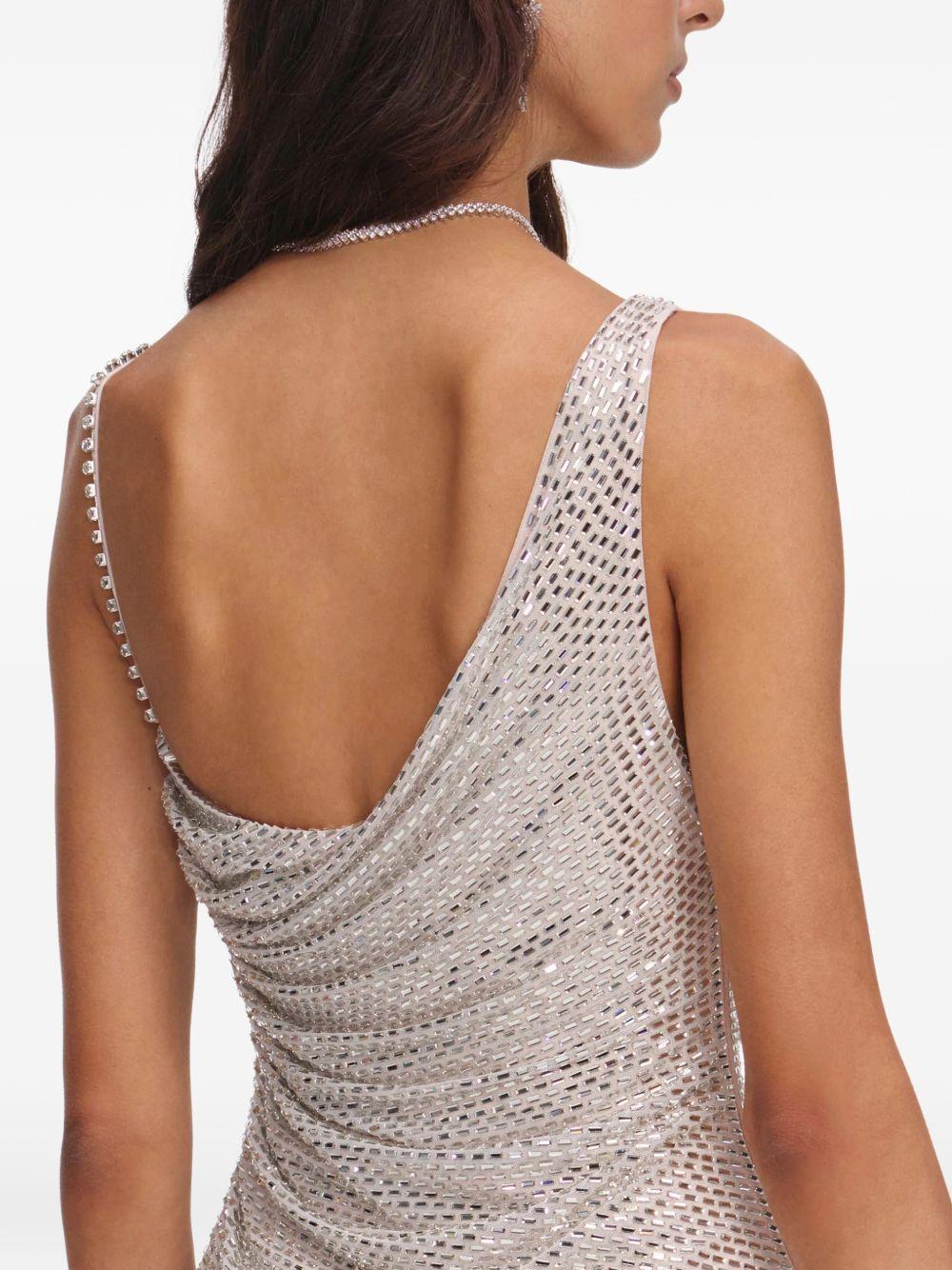Miniabito decorato con strass in beige 