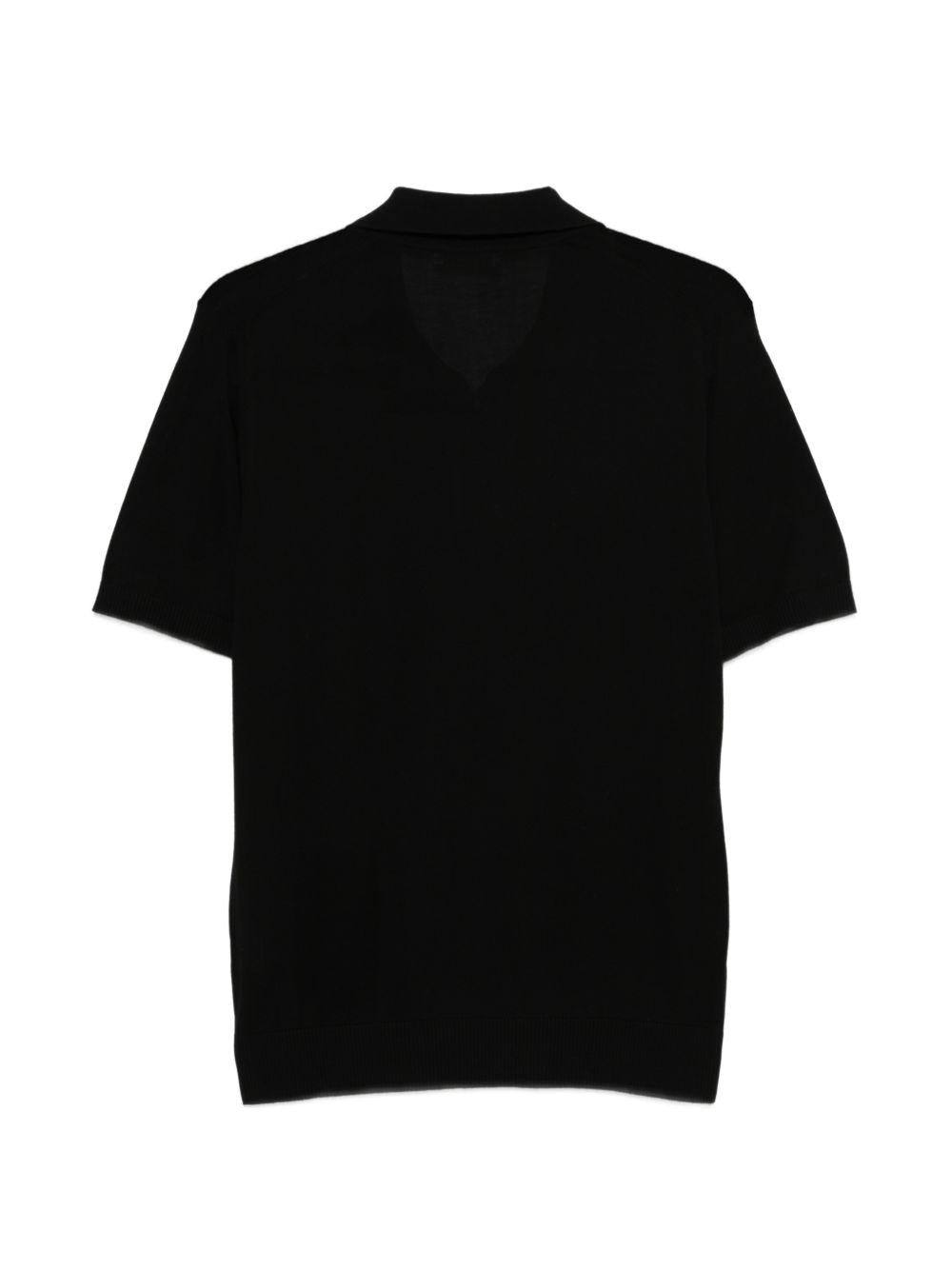 T-shirt a coste con collo polo in nero Kangra - uomo 