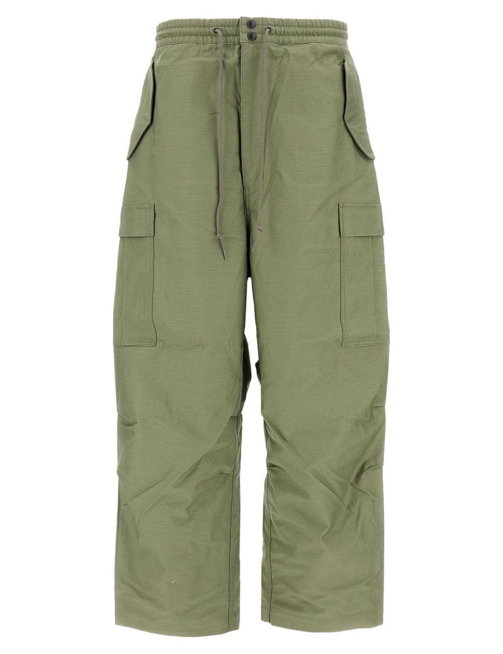 Pantaloni con tasche cargo in verde Junya watanabe - uomo 