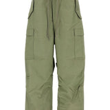 Pantaloni con tasche cargo in verde Junya watanabe - uomo 