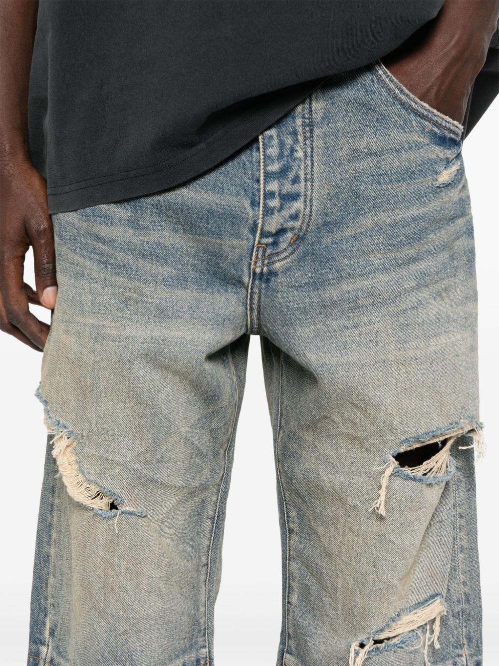Jeans a gamba ampia con effetto vissuto in blu Purple - uomo 