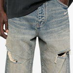 Jeans a gamba ampia con effetto vissuto in blu Purple - uomo 