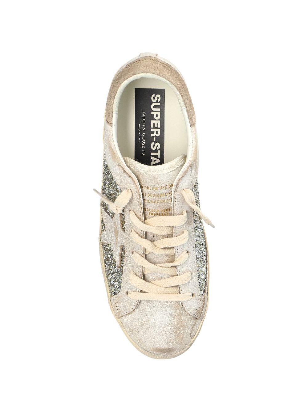 Sneakers super star glitter in avorio e argento golden goose - donna 