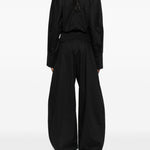 Tuta intera con scollo a V in nero The latest - donna 