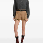 Shorts in lana con fodera a vista in marrone 