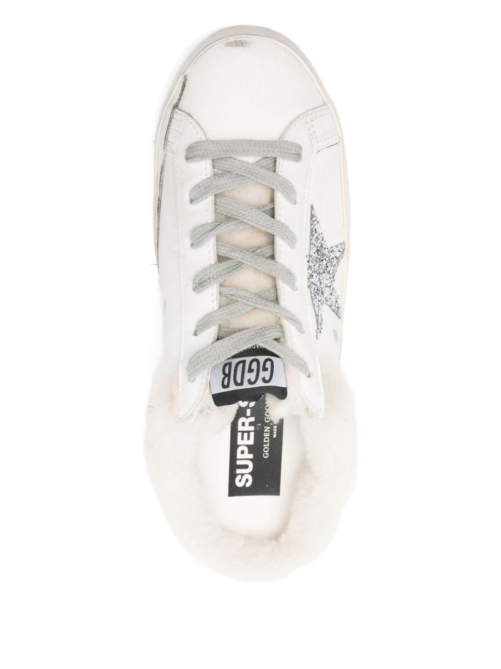 Mules con shearling super star in bianco 