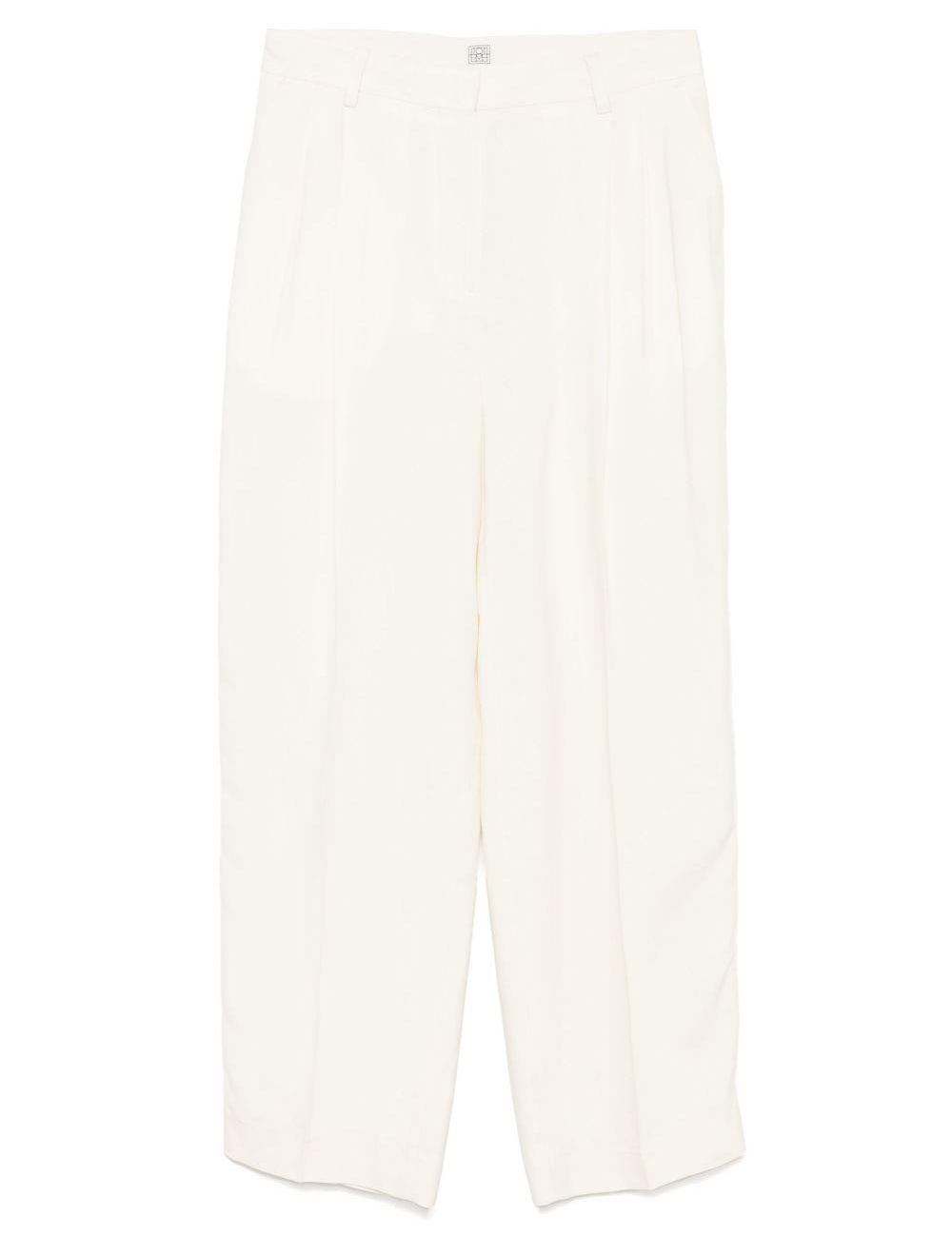 Pantaloni fluidi a doppia piega in bianco Toteme - donna 
