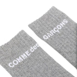 Calzini alti con logo in grigio Comme des garcons homme plus - uomo 
