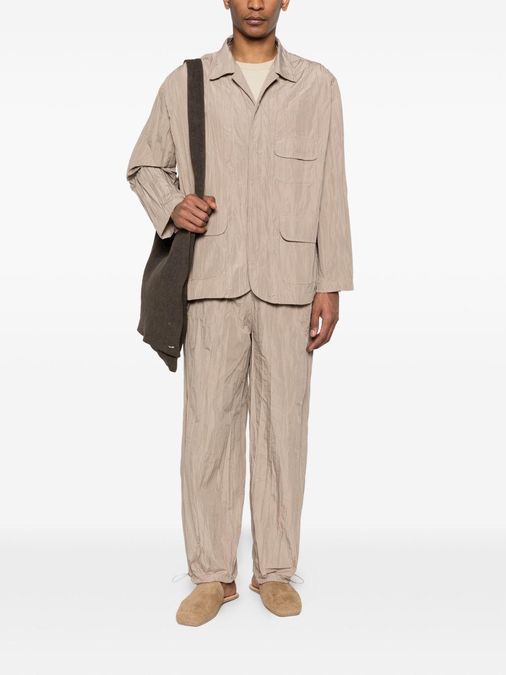 Giacca con effetto stropicciato in beige GONGDID DESIGN - uomo 