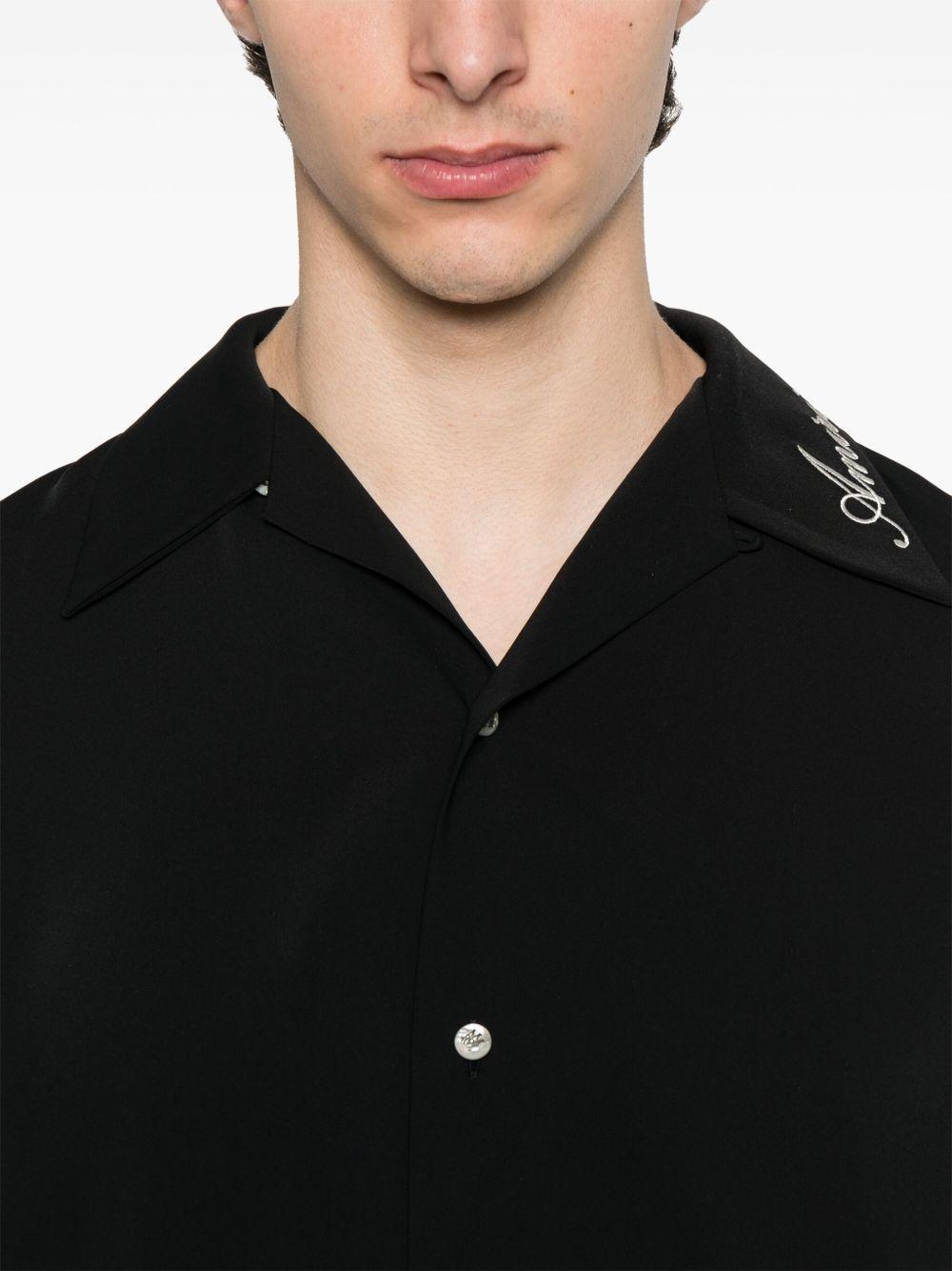 Camicia a maniche corte in nero 