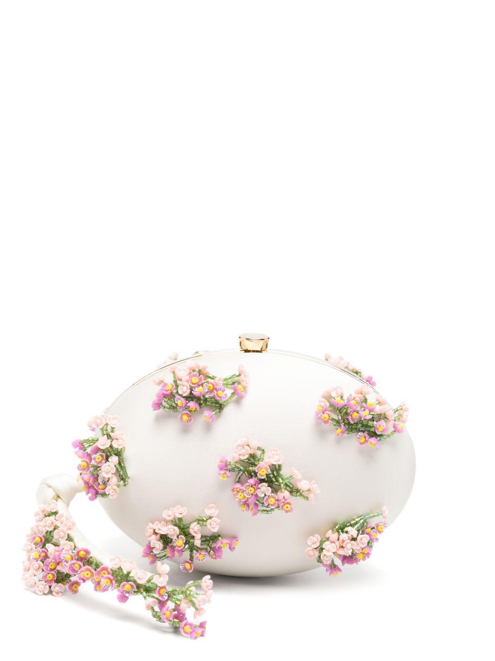 Clutch ovale con fiori in crema 