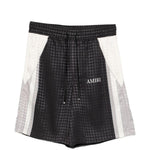Pantaloncini con coulisse a quadri in nero Amiri - uomo 