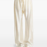 Pantaloni Rohen satinati in avorio Khaite - donna 