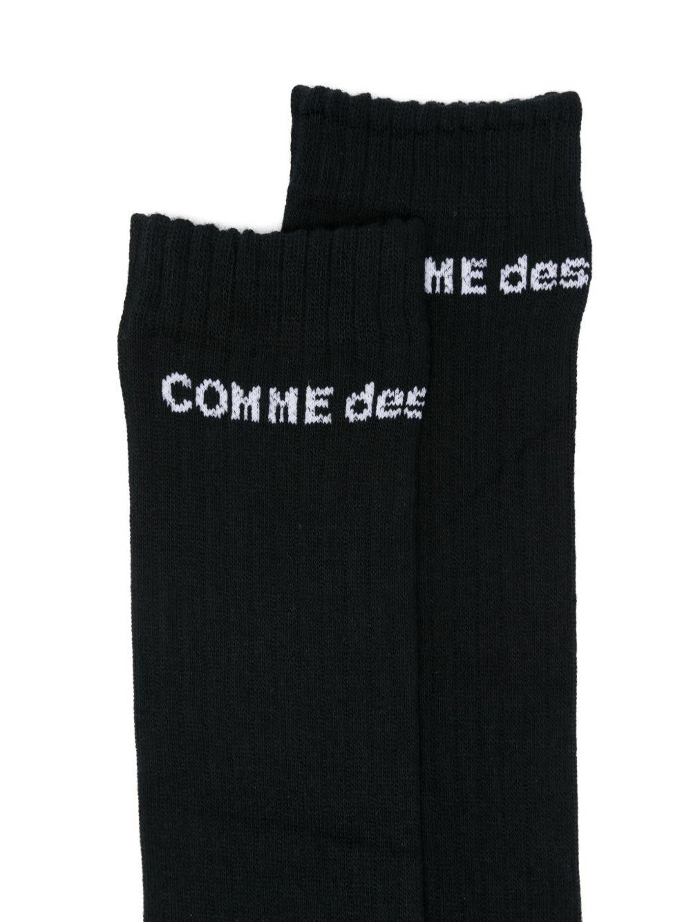 Calzini alti con logo in nero  Comme des garcons homme plus - uomo<BR/> 