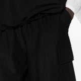 Pantaloncini cargo con coulisse in nero Comme des garcons homme - uomo 