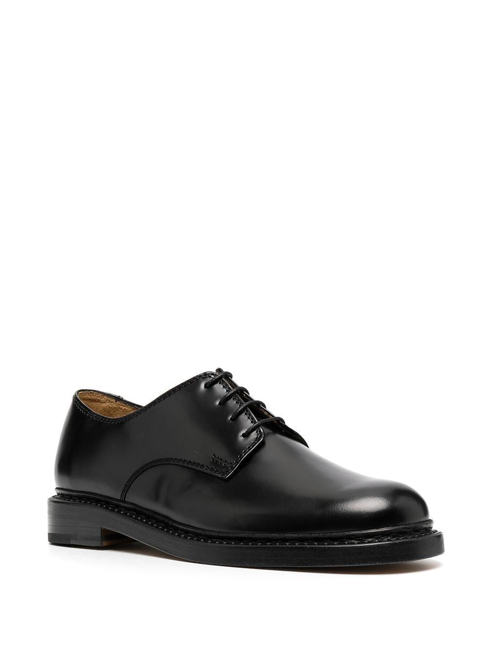 Derby uniform parade in nero Our legacy - uomo 