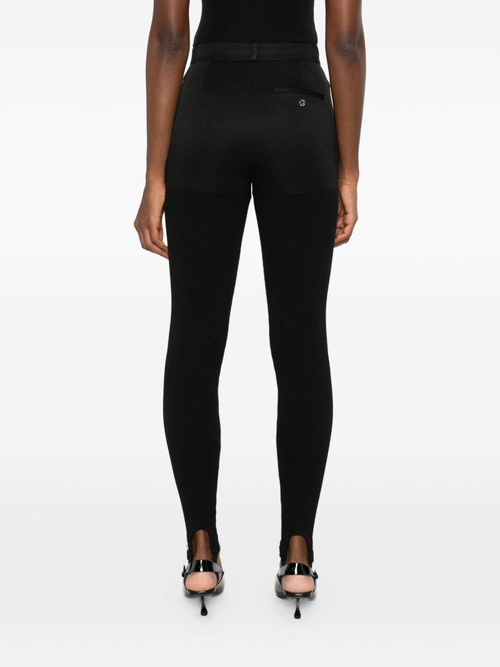 Leggings con staffe in nero Coperni - donna 
