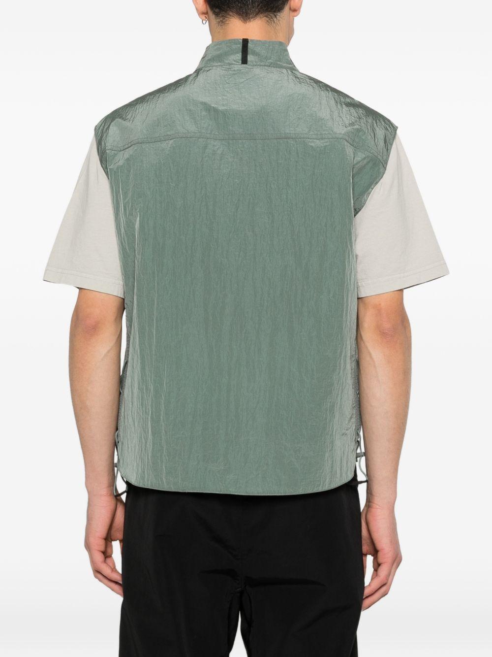 Gilet con tasca con zip in verde Oakley - uomo 